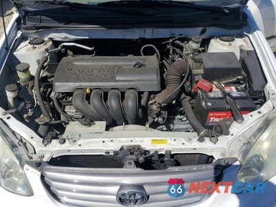 Zdjęcie 11 z 12 samochodu: 2003 TOYOTA COROLLA CE VIN:1NXBR32E73Z006752 - miniatura