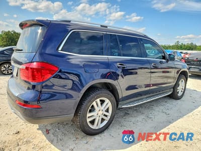 Trzecie zdjęcie samochodu z tyłu: 2013 MERCEDES-BENZ GL 450 4MATIC VIN:4JGDF7CE5DA169359 - miniatura