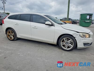 Czwarte zdjęcie samochodu z boku: 2015 VOLVO V60 PREMIER VIN:YV140MEK3F1256391 - miniatura