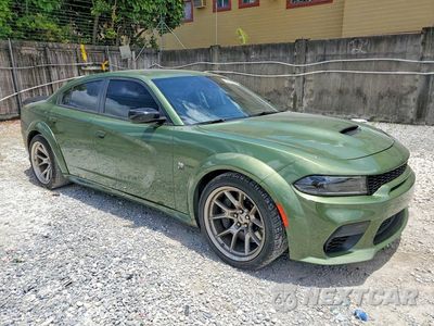 Czwarte zdjęcie samochodu z boku: 2023 DODGE CHARGER SCAT PACK VIN:2C3CDXGJ9PH622048 - miniatura