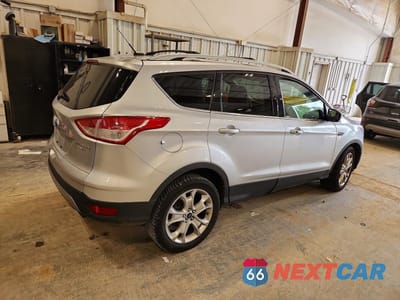 Trzecie zdjęcie samochodu z tyłu: 2015 FORD ESCAPE TITANIUM VIN:1FMCU9J99FUC64351 - miniatura