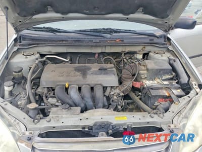 Zdjęcie 11 z 12 samochodu: 2003 TOYOTA COROLLA CE VIN:1NXBR32E73Z030565 - miniatura