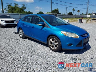 Czwarte zdjęcie samochodu z boku: 2013 FORD FOCUS SE VIN:1FADP3F28DL155803 - miniatura