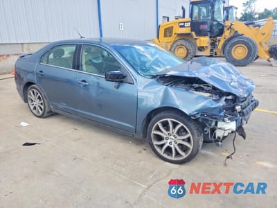 Czwarte zdjęcie samochodu z boku: 2012 FORD FUSION VIN:3FAHP0JA0CR212025 - miniatura