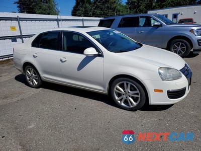 Czwarte zdjęcie samochodu z boku: 2006 VOLKSWAGEN JETTA TDI OPTION PACKAGE 2 VIN:3VWDT71KX6M661510 - miniatura