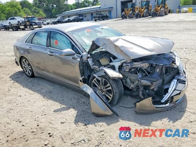 Czwarte zdjęcie samochodu z boku: 2015 LINCOLN MKZ VIN:3LN6L2J98FR601915 - miniatura