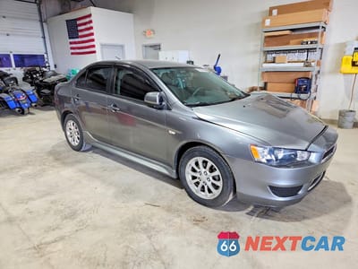 Czwarte zdjęcie samochodu z boku: 2014 MITSUBISHI LANCER ES/ES SPORT VIN:JA32U2FU4EU009477 - miniatura