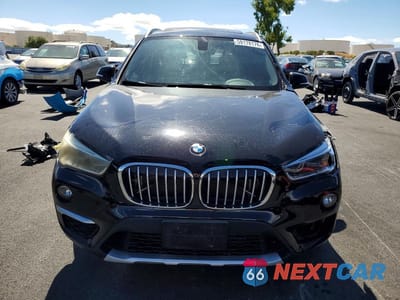 Piąte zdjęcie samochodu w środku: 2018 BMW X1 XDRIVE28I VIN:WBXHT3C36J5K20462 - miniatura
