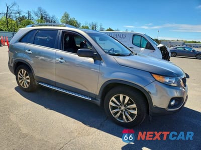 Czwarte zdjęcie samochodu z boku: 2011 KIA SORENTO EX VIN:5XYKUDA25BG179119 - miniatura