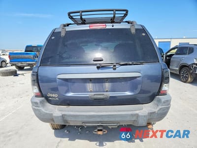 Zdjęcie 6 z 13 samochodu: 2002 JEEP GRAND CHEROKEE LAREDO VIN:1J4GW48S62C223679 - miniatura