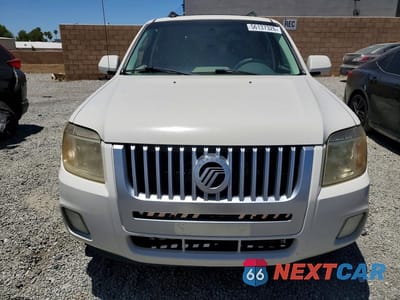 Piąte zdjęcie samochodu w środku: 2011 MERCURY MARINER PREMIER VIN:4M2CN8HG8BKJ02422 - miniatura