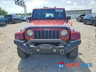 Piąte zdjęcie samochodu w środku: 2009 JEEP WRANGLER UNLIMITED SAHARA VIN:1J4GA59179L767158 - miniatura