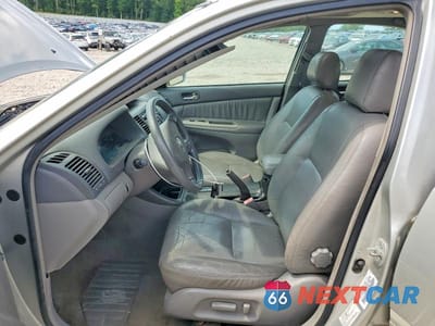 Zdjęcie 7 z 12 samochodu: 2003 TOYOTA CAMRY LE VIN:4T1BE32K03U665922 - miniatura