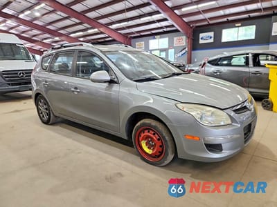 Czwarte zdjęcie samochodu z boku: 2012 HYUNDAI ELANTRA TOURING GLS VIN:KMHDC8AE1CU152928 - miniatura