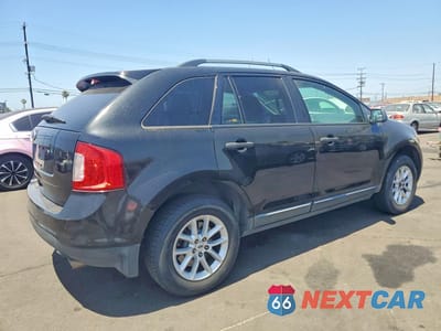Trzecie zdjęcie samochodu z tyłu: 2013 FORD EDGE SE VIN:2FMDK3GC7DBC93117 - miniatura