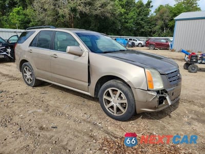 Czwarte zdjęcie samochodu z boku: 2004 CADILLAC SRX VIN:1GYEE63A540157179 - miniatura