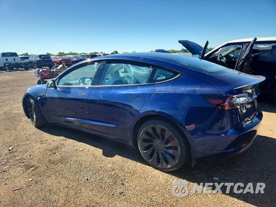 Trzecie zdjęcie samochodu z tyłu: 2022 TESLA MODEL 3 VIN:5YJ3E1EC7NF266762 - miniatura