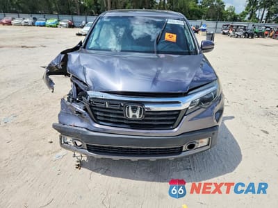 Piąte zdjęcie samochodu w środku: 2020 HONDA RIDGELINE RTL VIN:5FPYK3F79LB017900 - miniatura