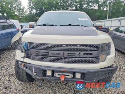 Piąte zdjęcie samochodu w środku: 2013 FORD F150 SVT RAPTOR VIN:1FTFW1R61DFC11958 - miniatura
