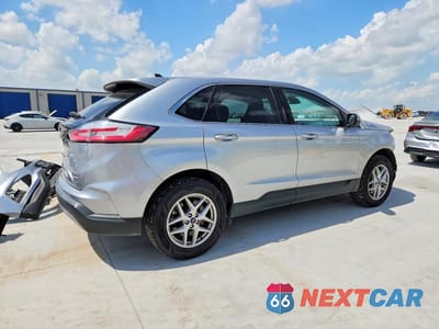 Trzecie zdjęcie samochodu z tyłu: 2022 FORD EDGE SEL VIN:2FMPK4J90NBA91639 - miniatura