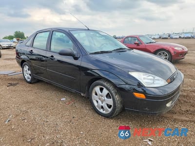 Czwarte zdjęcie samochodu z boku: 2002 FORD FOCUS ZTS VIN:1FAFP38382W307525 - miniatura