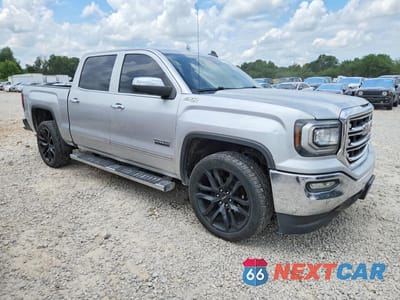 Czwarte zdjęcie samochodu z boku: 2018 GMC SIERRA K1500 SLT VIN:3GTU2NEC9JG184315 - miniatura