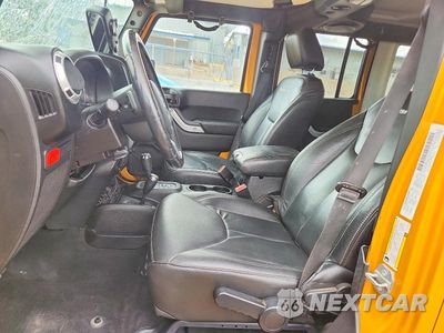 Zdjęcie 7 z 12 samochodu: 2014 JEEP WRANGLER UNLIMITED RUBICON VIN:1C4HJWFG0EL302028 - miniatura