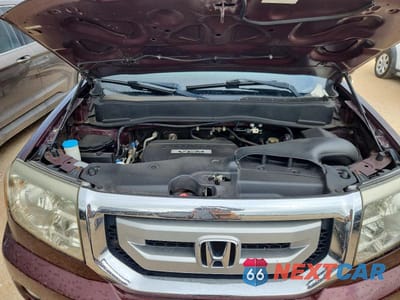 Zdjęcie 12 z 13 samochodu: 2010 HONDA PILOT EXL VIN:5FNYF4H63AB014849 - miniatura