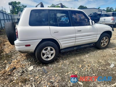 Trzecie zdjęcie samochodu z tyłu: 2000 TOYOTA RAV4 BASE VIN:JT3HP10V6Y7168698 - miniatura