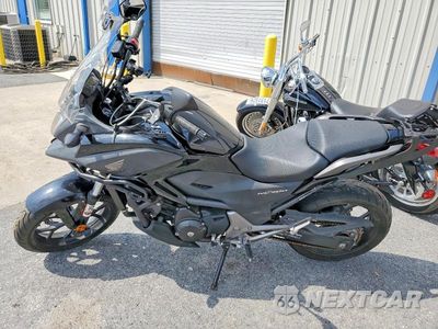 Trzecie zdjęcie samochodu z tyłu: 2014 HONDA NC700X VIN:JH2RC6302EK000663 - miniatura