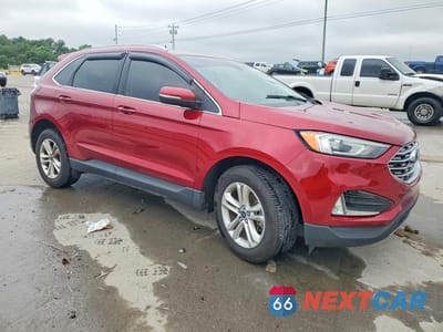 Czwarte zdjęcie samochodu z boku: 2019 FORD EDGE SEL VIN:2FMPK3J99KBC17759 - miniatura