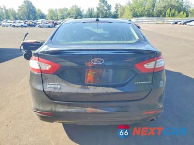 Zdjęcie 6 z 12 samochodu: 2016 FORD FUSION TITANIUM PHEV VIN:3FA6P0SU4GR320511 - miniatura