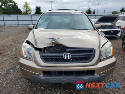Piąte zdjęcie samochodu w środku: 2005 HONDA PILOT EX VIN:5FNYF18485B052838 - miniatura