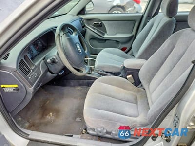 Zdjęcie 7 z 12 samochodu: 2004 HYUNDAI ELANTRA GLS VIN:KMHDN46D94U863894 - miniatura