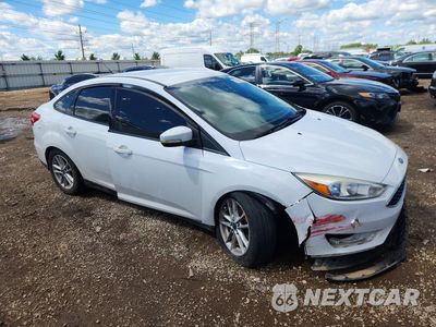 Czwarte zdjęcie samochodu z boku: 2017 FORD FOCUS SE VIN:1FADP3F23HL270119 - miniatura