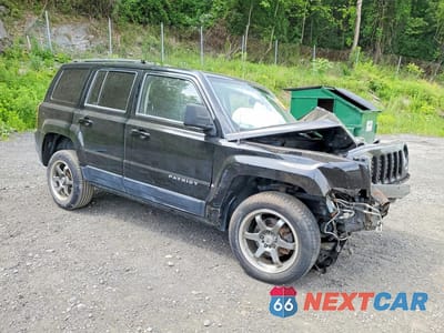 Czwarte zdjęcie samochodu z boku: 2014 JEEP PATRIOT SPORT VIN:1C4NJRBB5ED630070 - miniatura