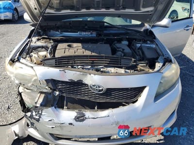 Zdjęcie 11 z 12 samochodu: 2009 TOYOTA COROLLA LE VIN:JTDBL40E39J050059 - miniatura