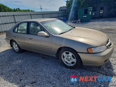 Czwarte zdjęcie samochodu z boku: 2000 NISSAN ALTIMA VIN:1N4DL01A4YC187596 - miniatura