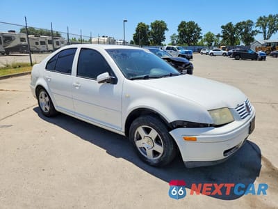 Czwarte zdjęcie samochodu z boku: 2000 VOLKSWAGEN JETTA GLS VIN:3VWSC29M1YM129226 - miniatura