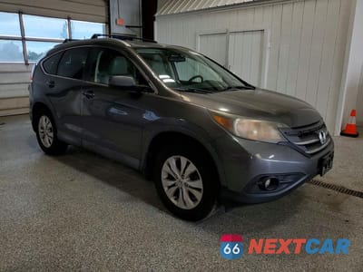 Czwarte zdjęcie samochodu z boku: 2014 HONDA CR-V EXL VIN:2HKRM3H72EH500752 - miniatura