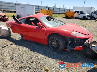 Czwarte zdjęcie samochodu z boku: 1999 FERRARI 360 MODENA VIN:ZFFYR51A0X0118199 - miniatura