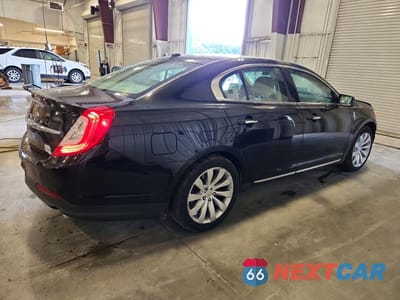 Trzecie zdjęcie samochodu z tyłu: 2015 LINCOLN MKS VIN:1LNHL9EK0FG601199 - miniatura