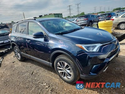 Czwarte zdjęcie samochodu z boku: 2018 TOYOTA RAV4 HYBRID LE VIN:JTMRJREVXJD254340 - miniatura