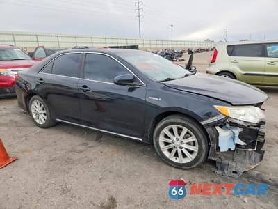Czwarte zdjęcie samochodu z boku: 2012 TOYOTA CAMRY HYBRID XLE VIN:4T1BD1FK2CU004071 - miniatura