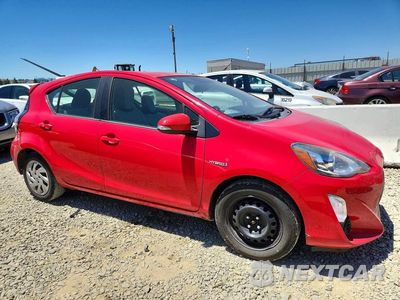 Czwarte zdjęcie samochodu z boku: 2015 TOYOTA PRIUS C ONE VIN:JTDKDTB30F1578799 - miniatura