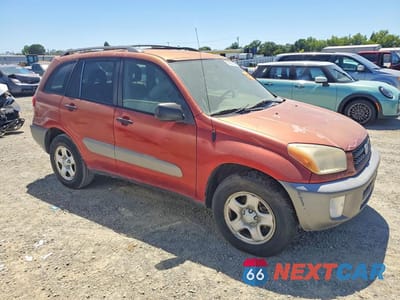 Czwarte zdjęcie samochodu z boku: 2002 TOYOTA RAV4 BASE VIN:JTEGH20V720049709 - miniatura