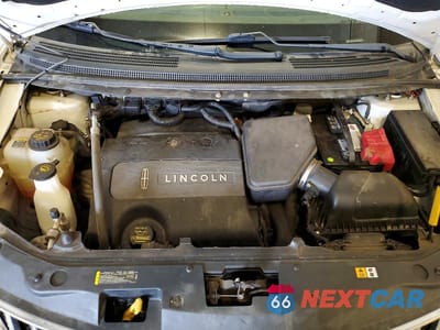 Zdjęcie 12 z 13 samochodu: 2013 LINCOLN MKX VIN:2LMDJ8JK8DBL15890 - miniatura