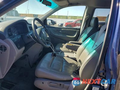 Zdjęcie 7 z 13 samochodu: 2004 HONDA ODYSSEY EXL VIN:5FNRL18024B006351 - miniatura