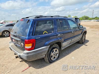 Trzecie zdjęcie samochodu z tyłu: 2000 JEEP GRAND CHEROKEE LAREDO VIN:1J4GW48S0YC206918 - miniatura