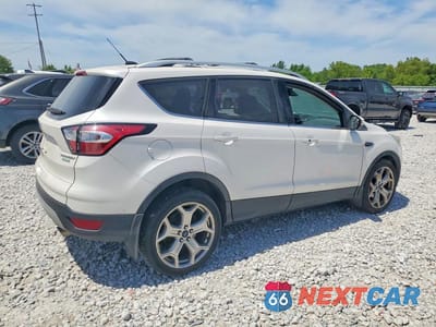 Trzecie zdjęcie samochodu z tyłu: 2017 FORD ESCAPE TITANIUM VIN:1FMCU0JD4HUD24328 - miniatura